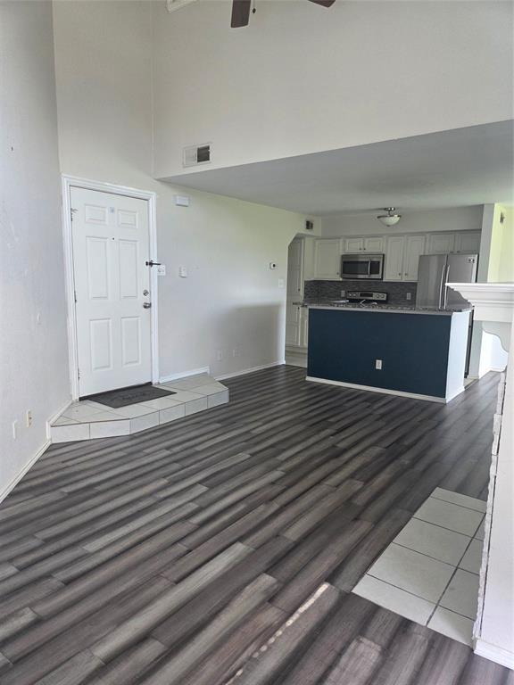 1704 Baird Farm Circle, Unit 4209 Arlington, TX 76006 - Photo 3 of 12 a view of kitchen and utility room