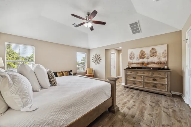 a bedroom with a bed and closet