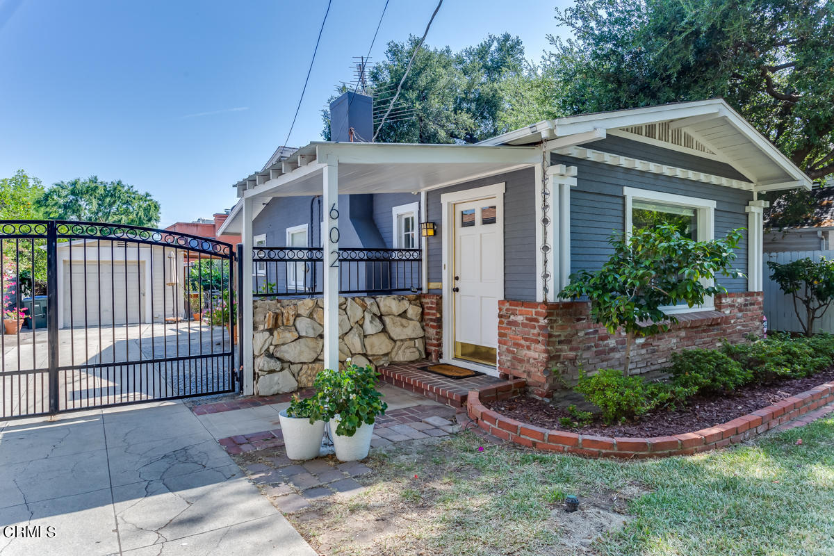 602 Atchison Street Pasadena, CA 91104 - Photo 1 of 34 a view of a house with wooden floor potted plants and roof