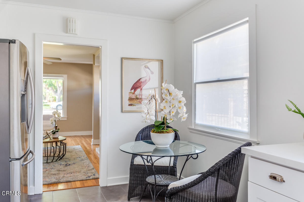 602 Atchison Street Pasadena, CA 91104 - Photo 16 of 34 a view of a dining room with furniture and a potted plant