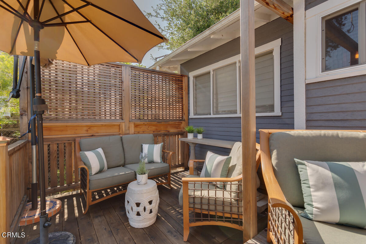 602 Atchison Street Pasadena, CA 91104 - Photo 24 of 34 an outdoor living area with furniture and a window