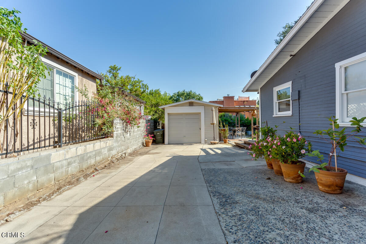 602 Atchison Street Pasadena, CA 91104 - Photo 25 of 34 a house with yard and a garden