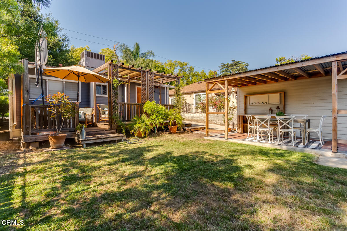 602 Atchison Street Pasadena, CA 91104 - Photo 28 of 34 a view of a house with backyard porch and sitting area