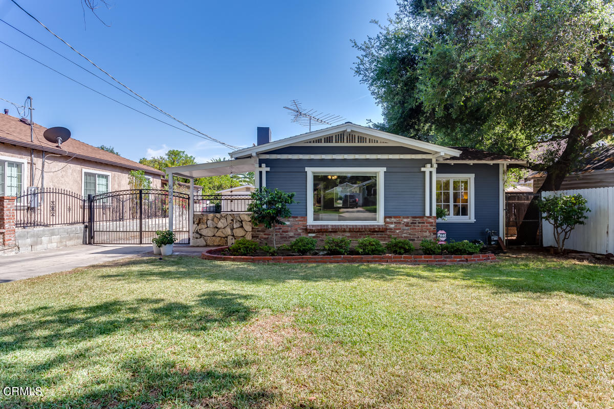 602 Atchison Street Pasadena, CA 91104 - Photo 3 of 34 a front view of a house with garden