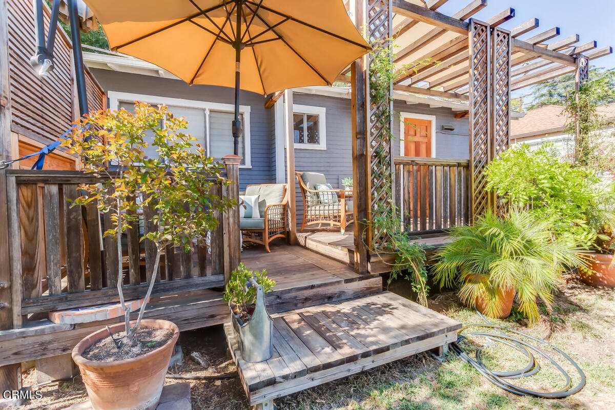 602 Atchison Street Pasadena, CA 91104 - Photo 32 of 34 a view of a backyard with plants and patio