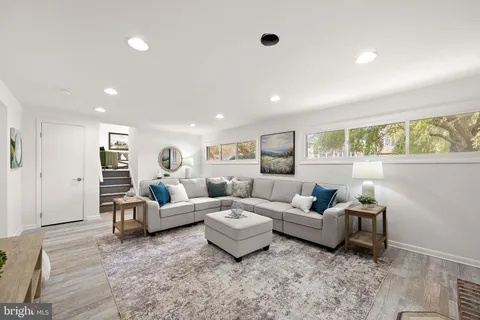 a living room with furniture and a couch