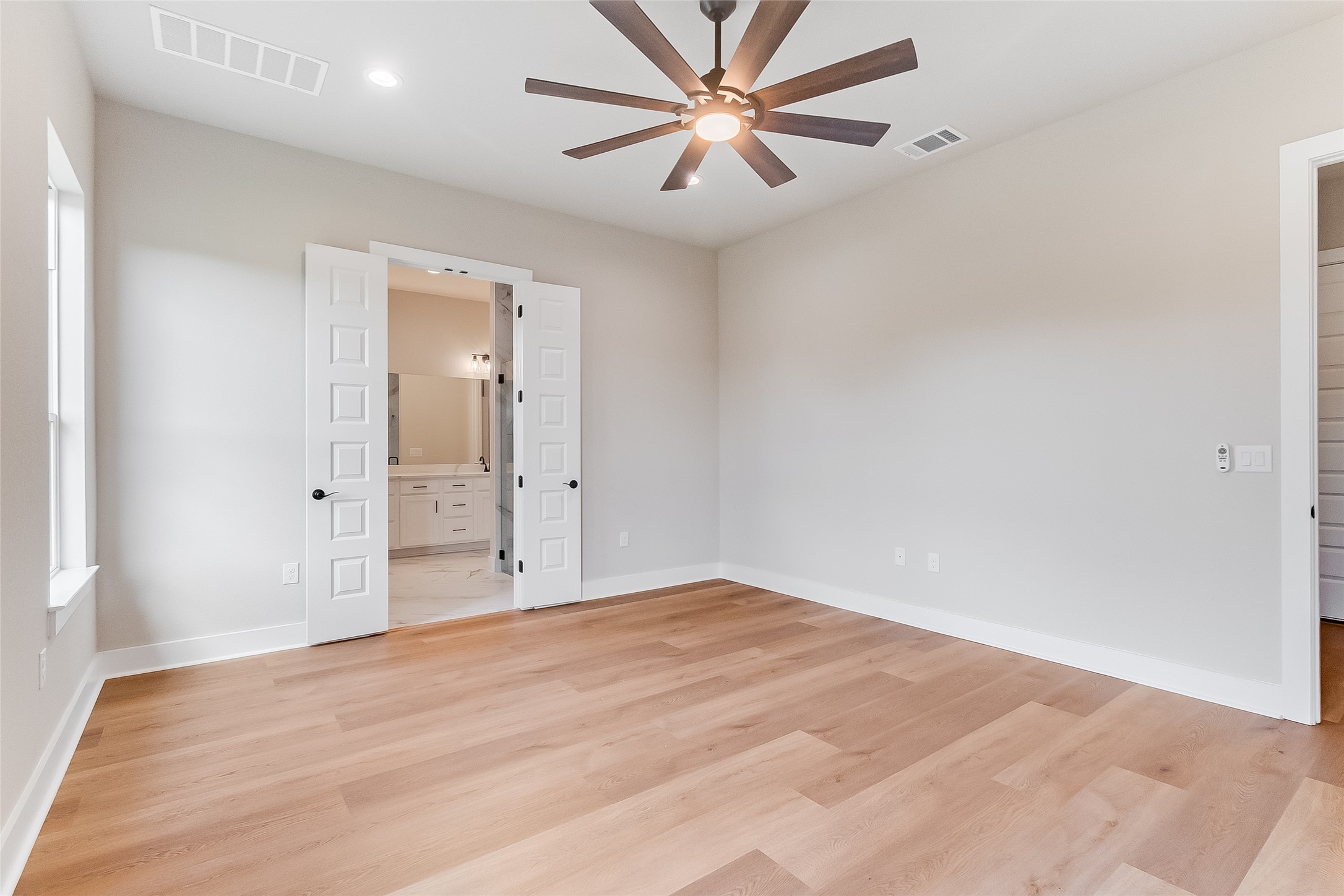 130 Draper Lane Bertram, TX 78605 - Photo 21 of 31 wooden floor in an empty room