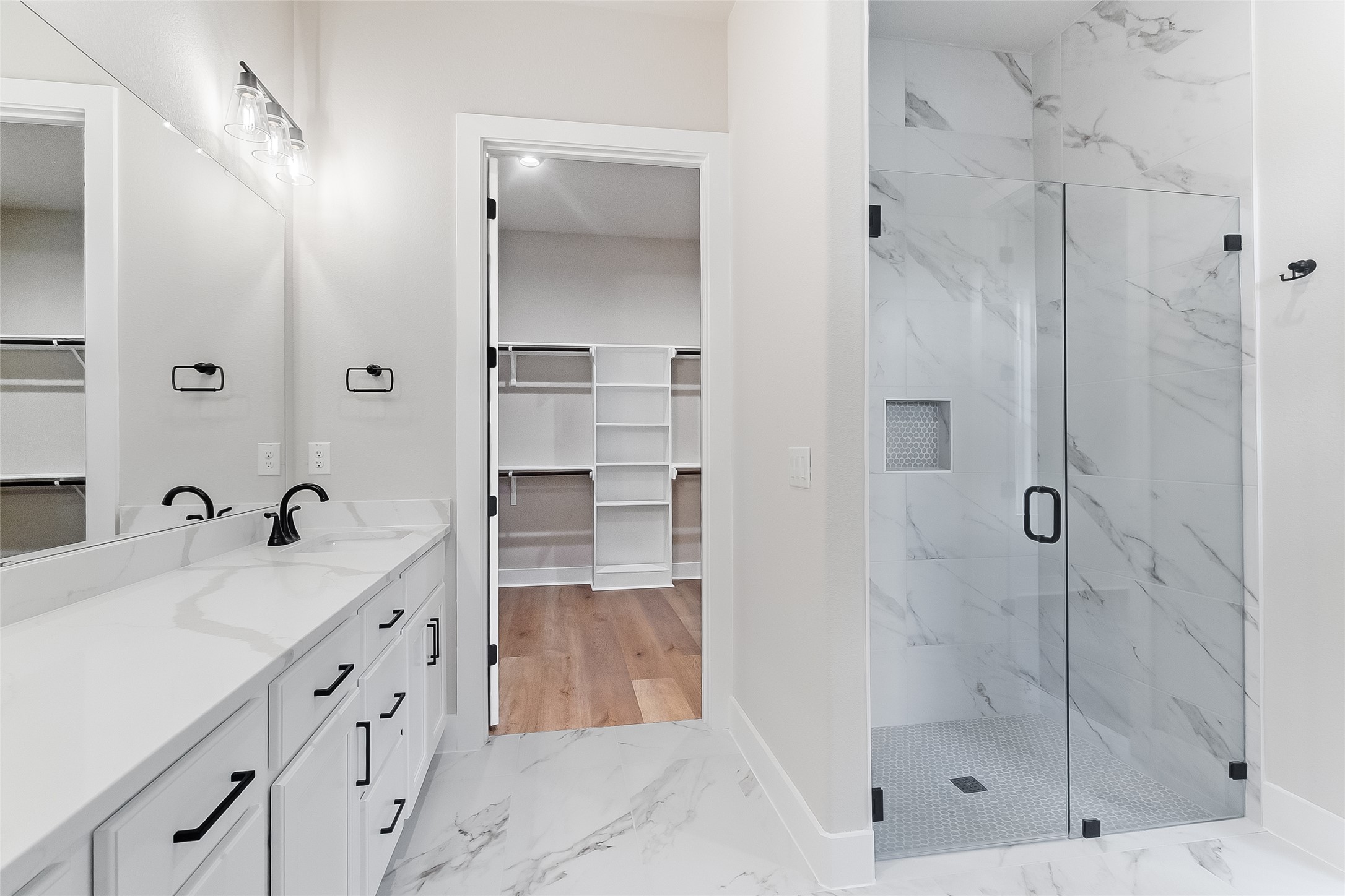 130 Draper Lane Bertram, TX 78605 - Photo 25 of 31 a bathroom with a bathtub and a sink