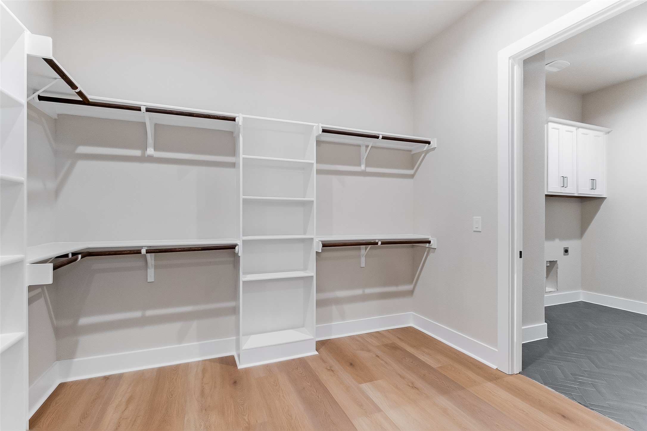 130 Draper Lane Bertram, TX 78605 - Photo 26 of 31 a view of walk in closet with empty racks