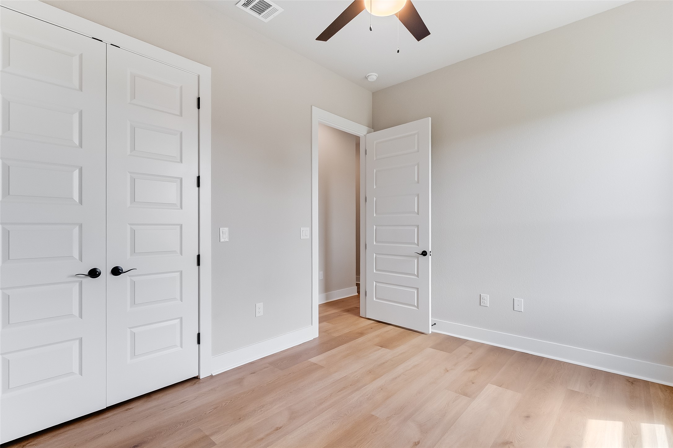 130 Draper Lane Bertram, TX 78605 - Photo 7 of 31 an empty room with closet area