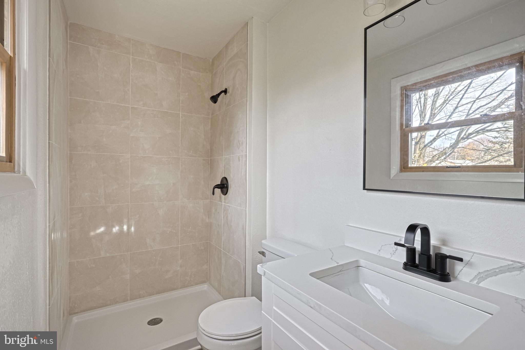 850 Jefferson Lane Red Lion, PA 17356 - Photo 34 of 82 a bathroom with a sink a toilet and shower