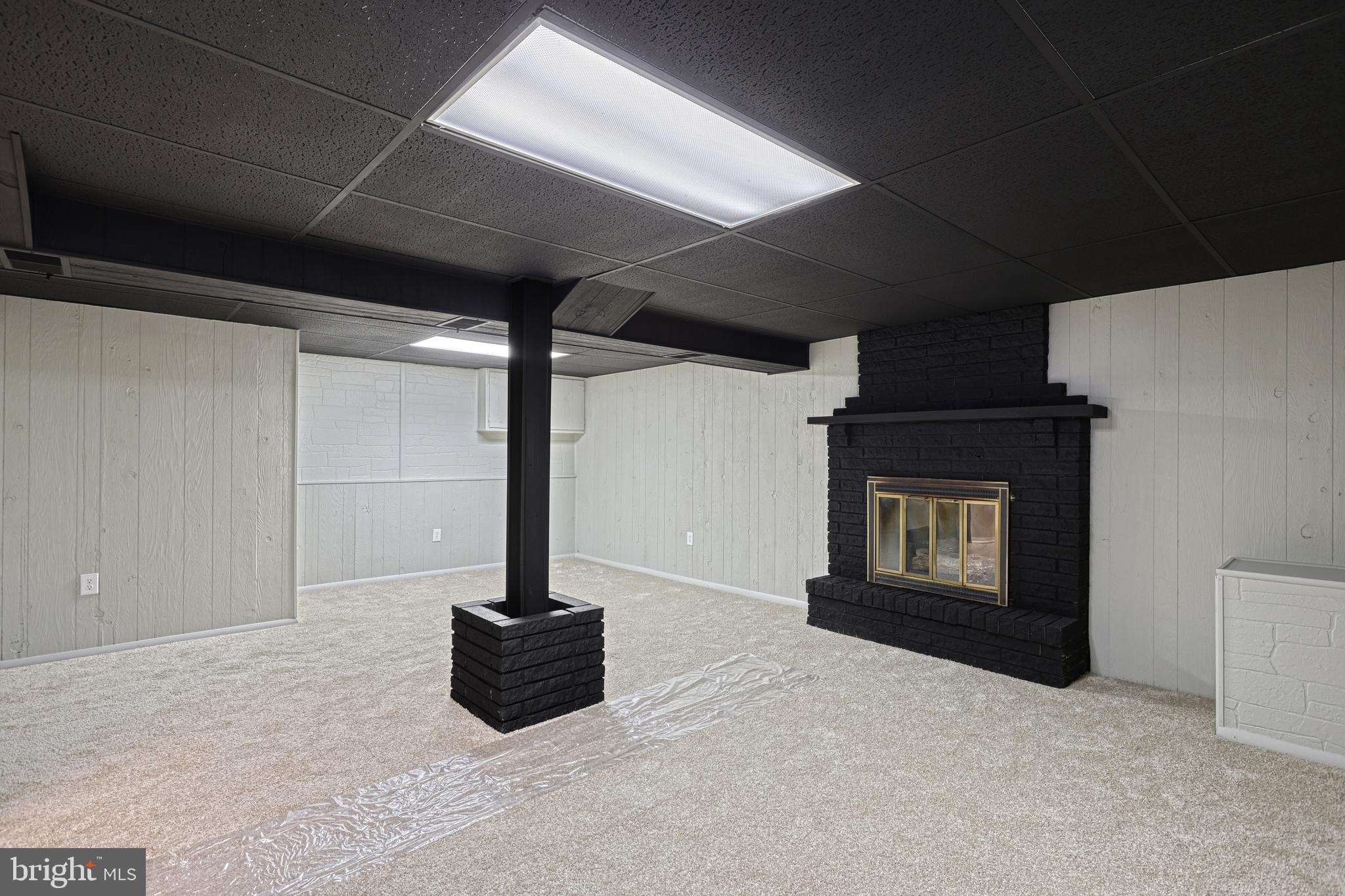 850 Jefferson Lane Red Lion, PA 17356 - Photo 46 of 82 a living room with hard wood floors and a fireplace