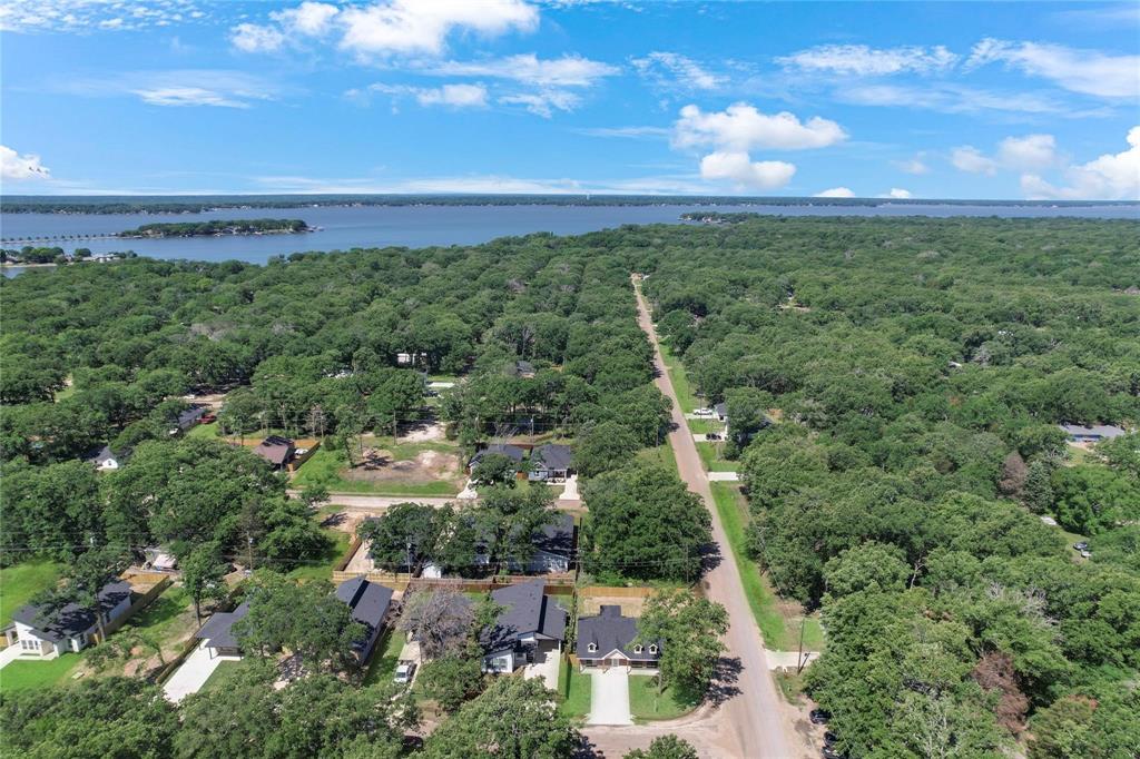 6151 Inca Drive Mabank, TX 75156 - Photo 2 of 2 a view of a city with lush green forest