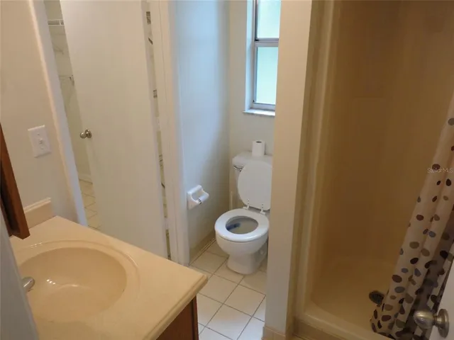 a bathroom with a sink and toilet