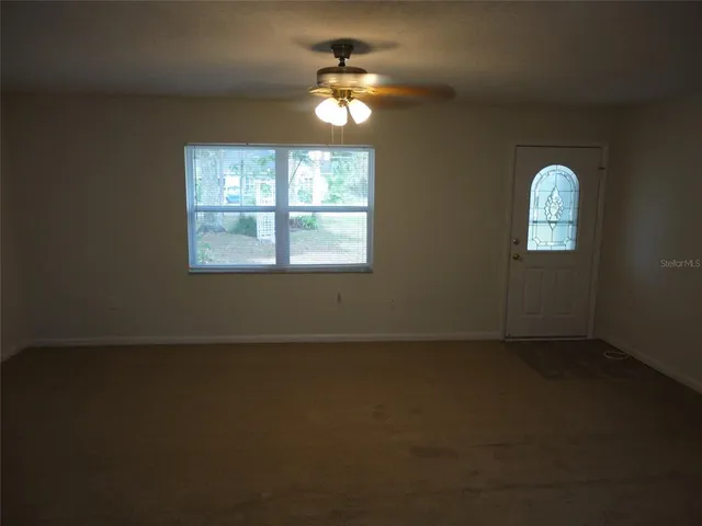 an empty room with a window