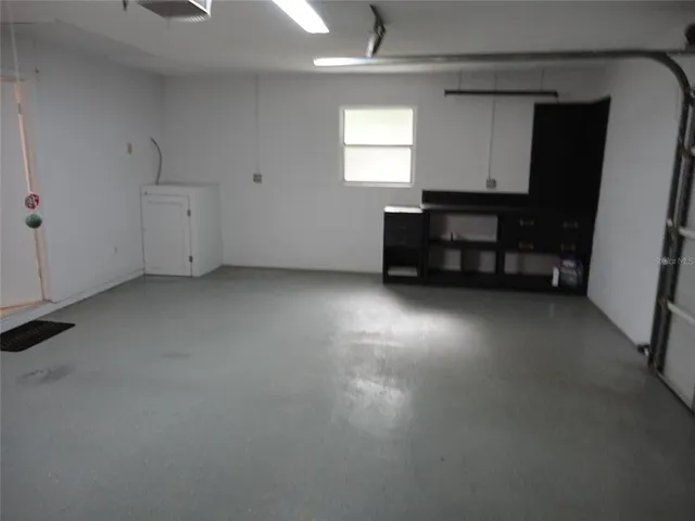a view of empty room with windows