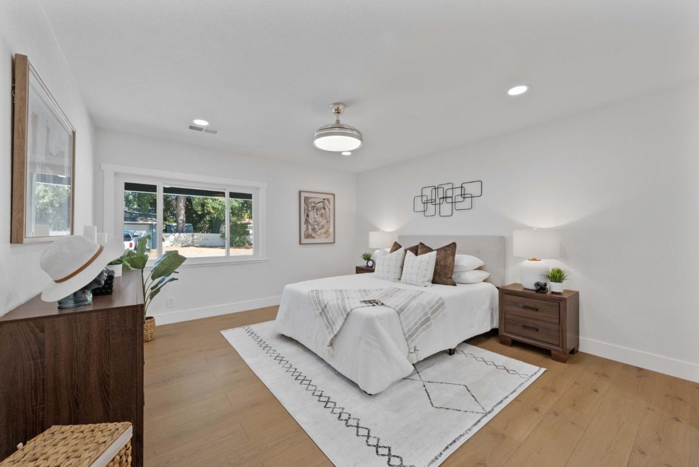 3905 Stanford Way Livermore, CA 94550 - Photo 11 of 32 a spacious bedroom with a large bed and a window