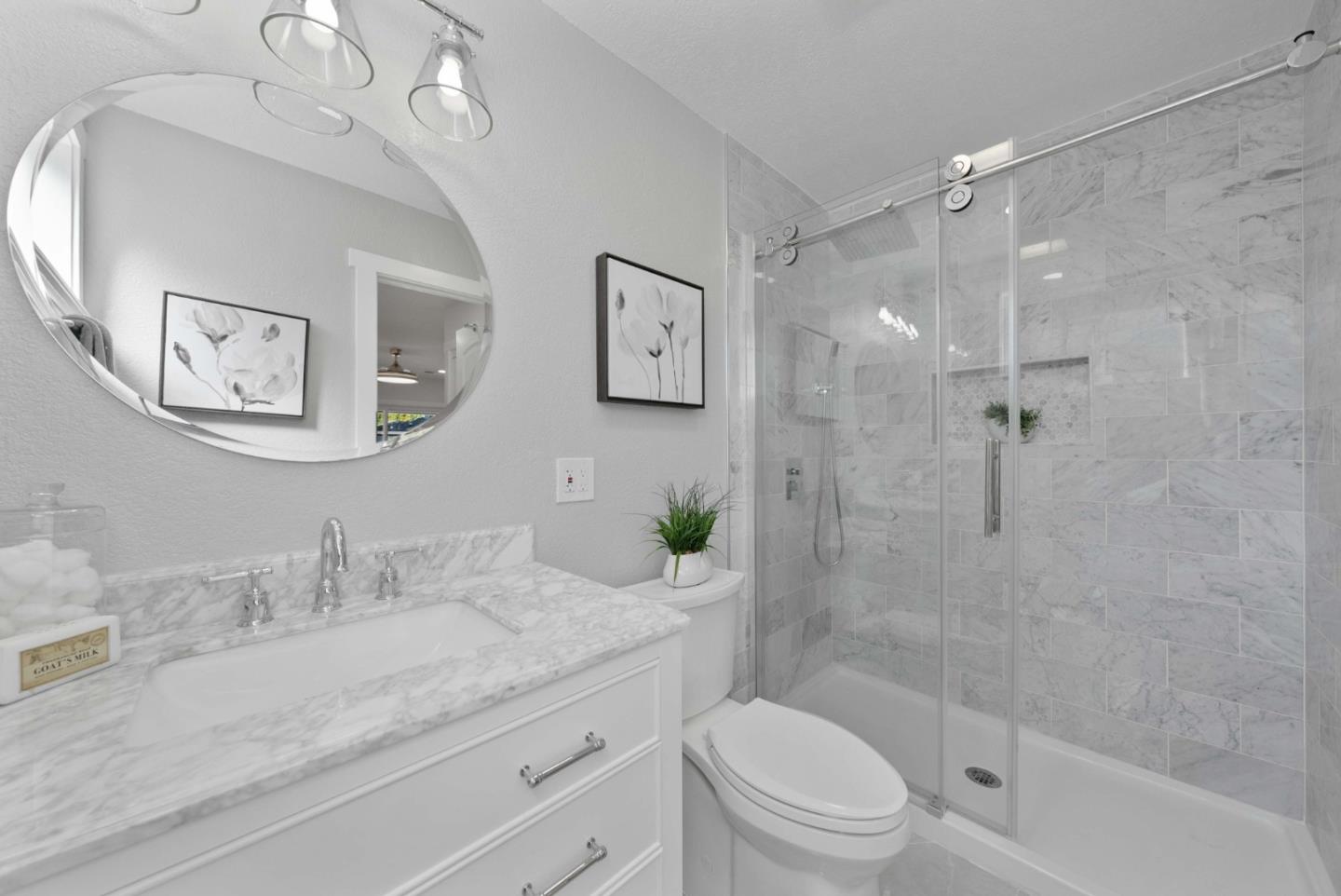 3905 Stanford Way Livermore, CA 94550 - Photo 14 of 32 a bathroom with a granite countertop sink a toilet and shower