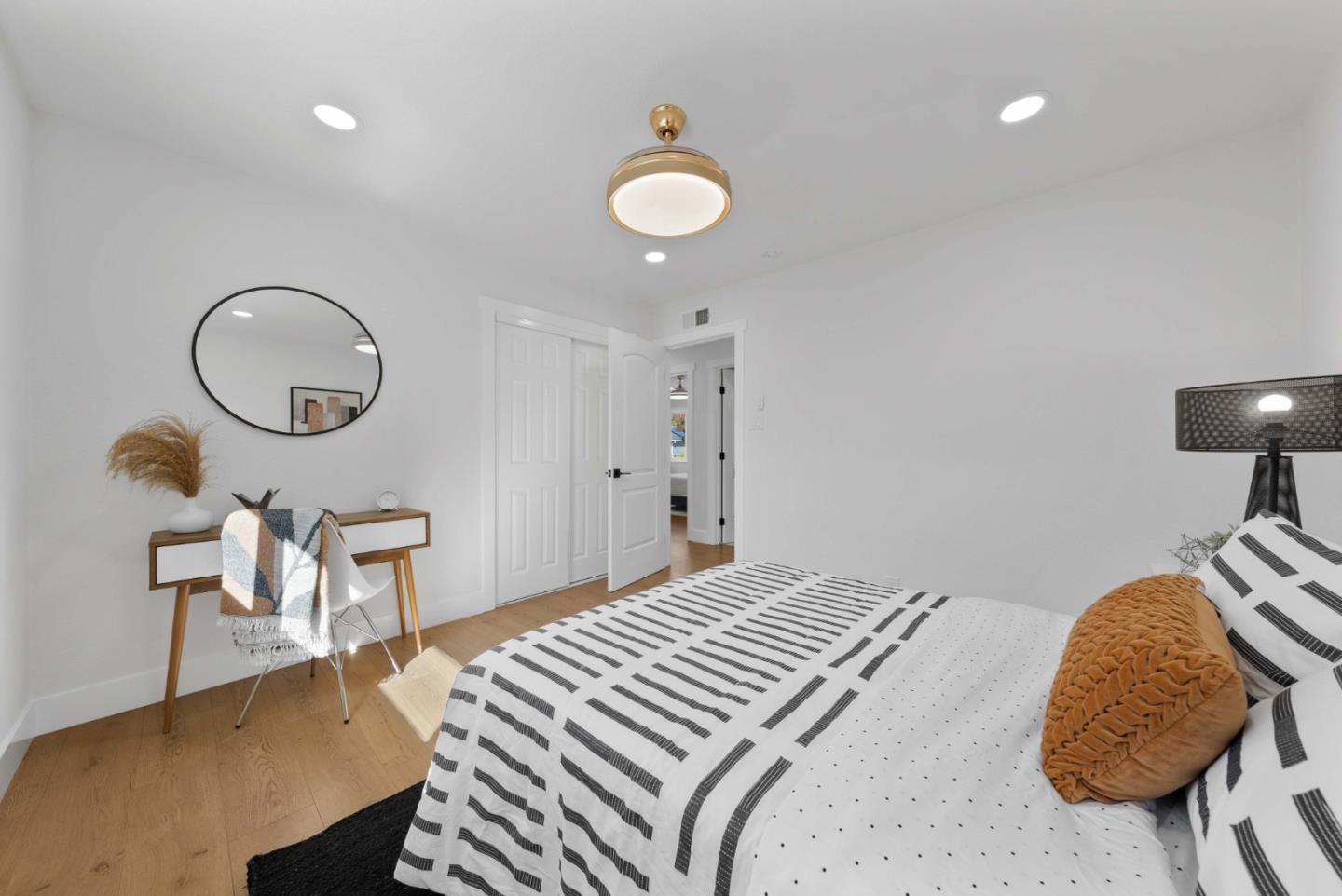 3905 Stanford Way Livermore, CA 94550 - Photo 17 of 32 a bedroom with a bed and a chandelier