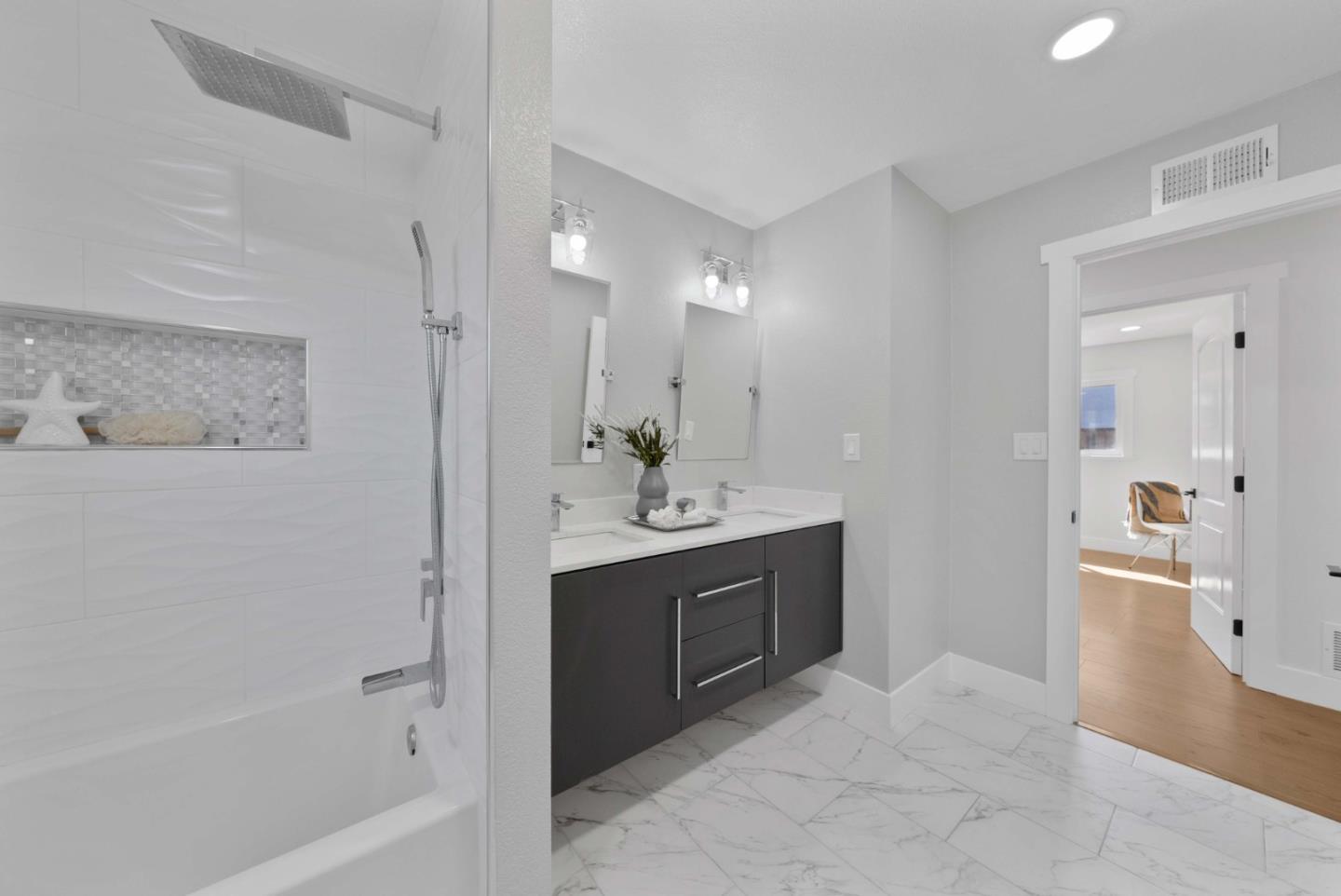 3905 Stanford Way Livermore, CA 94550 - Photo 22 of 32 a bathroom with a bathtub sink and mirror