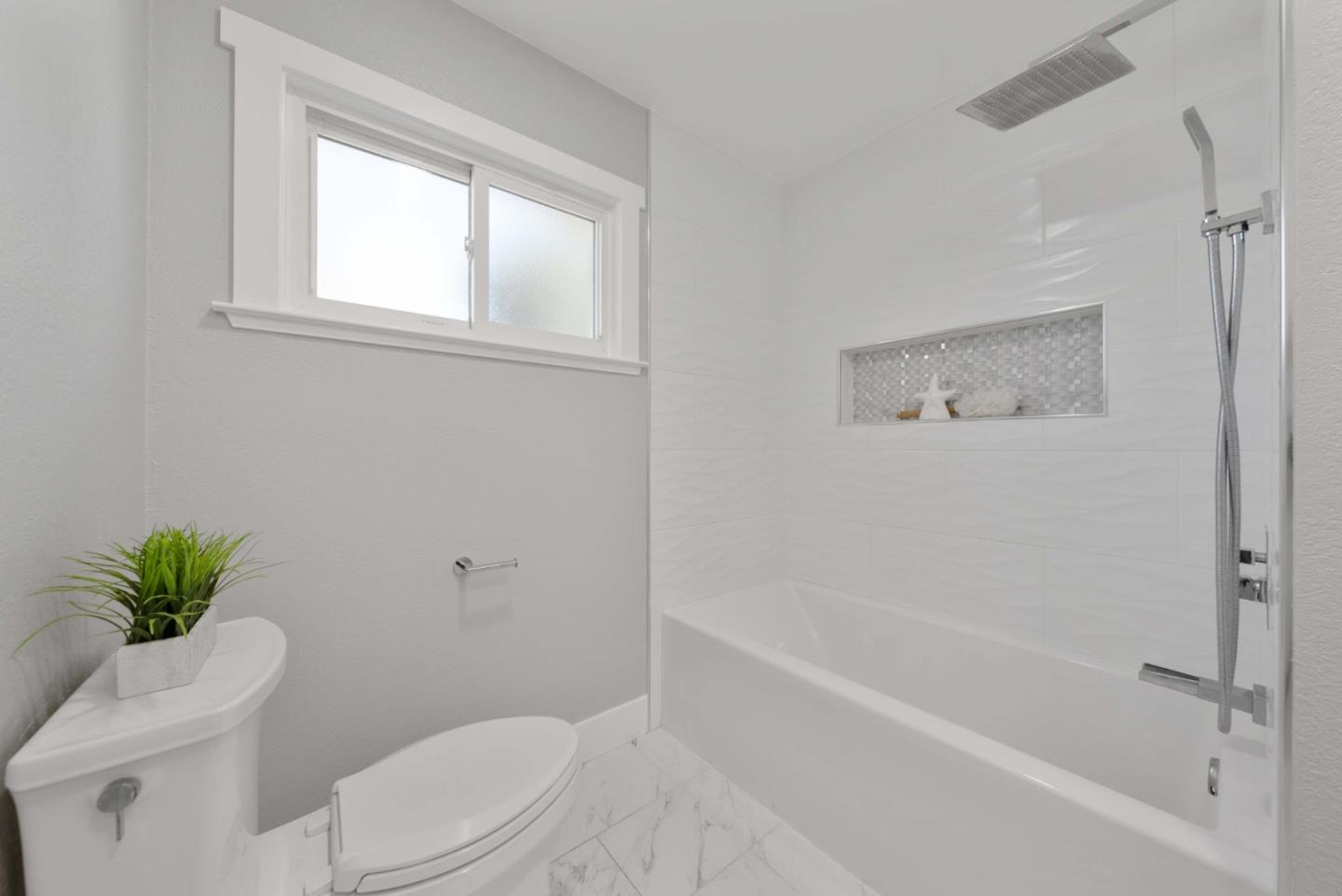 3905 Stanford Way Livermore, CA 94550 - Photo 23 of 32 a white toilet sitting next to a bath tub