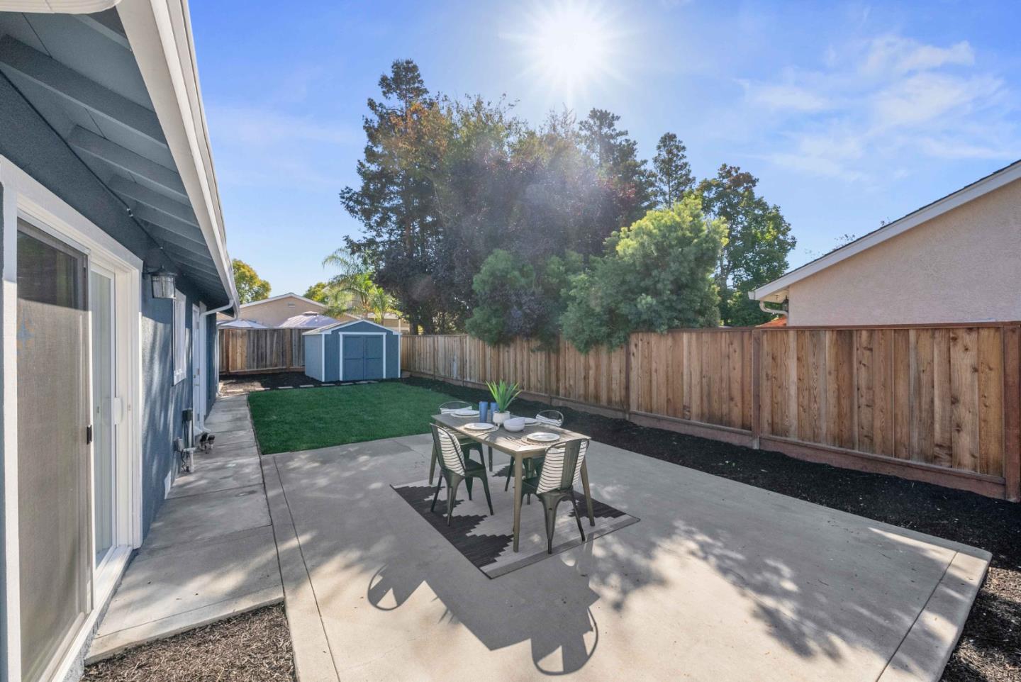 3905 Stanford Way Livermore, CA 94550 - Photo 24 of 32 a view of a chair and table in backyard of the house