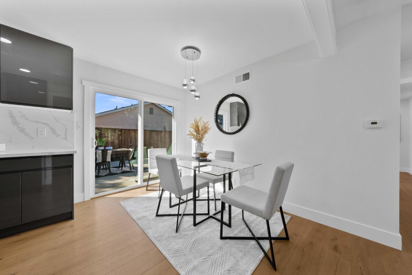 3905 Stanford Way Livermore, CA 94550 - Photo 5 of 32 a view of a dining room with furniture and a fireplace
