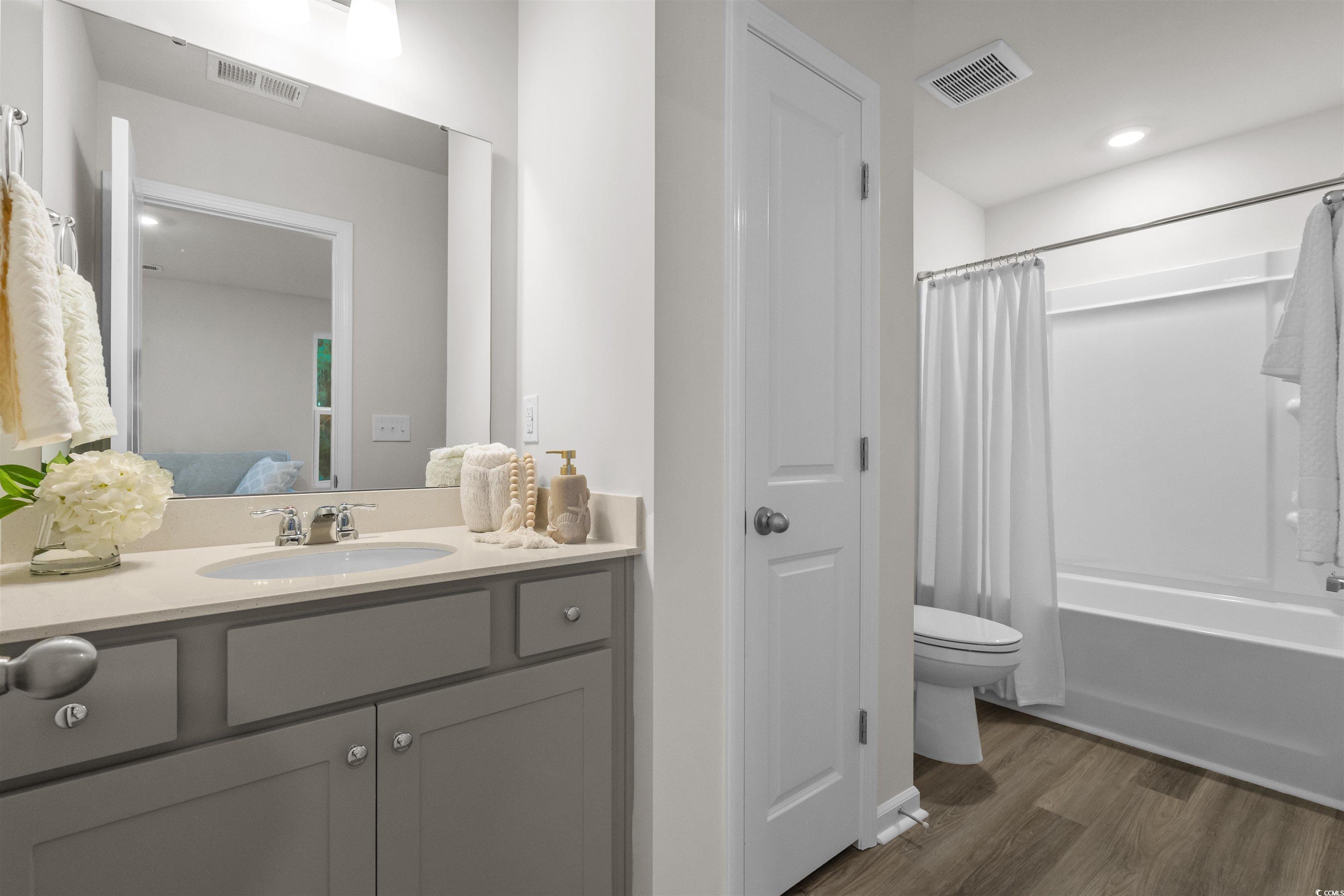 814 Palm Frond Way, Unit 42 Calabash, NC 28467 - Photo 30 of 31 Guest bathroom upstairs