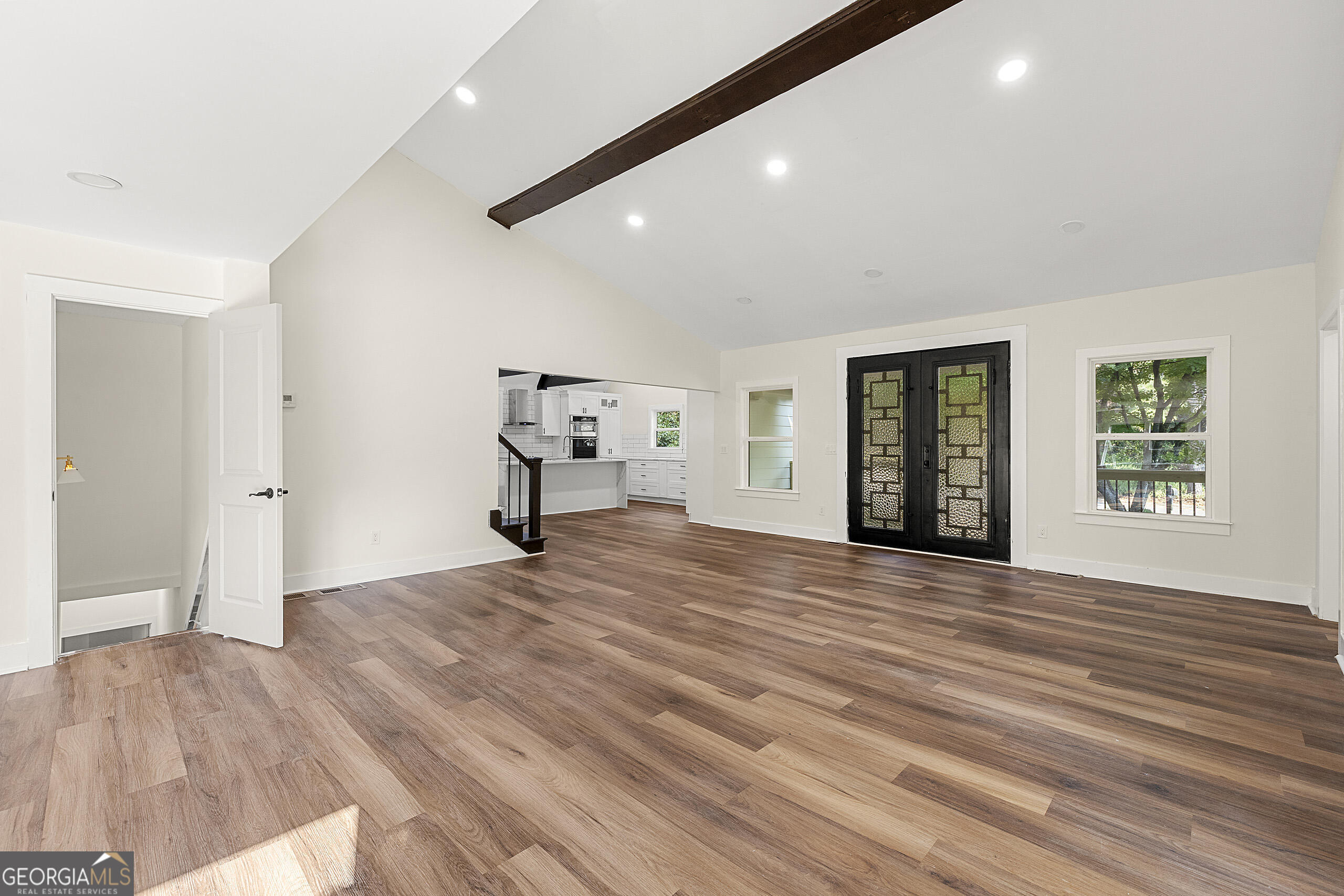 1620 Chevron Way Sandy Springs, GA 30350 - Photo 12 of 33 a view of empty room with wooden floor and fan