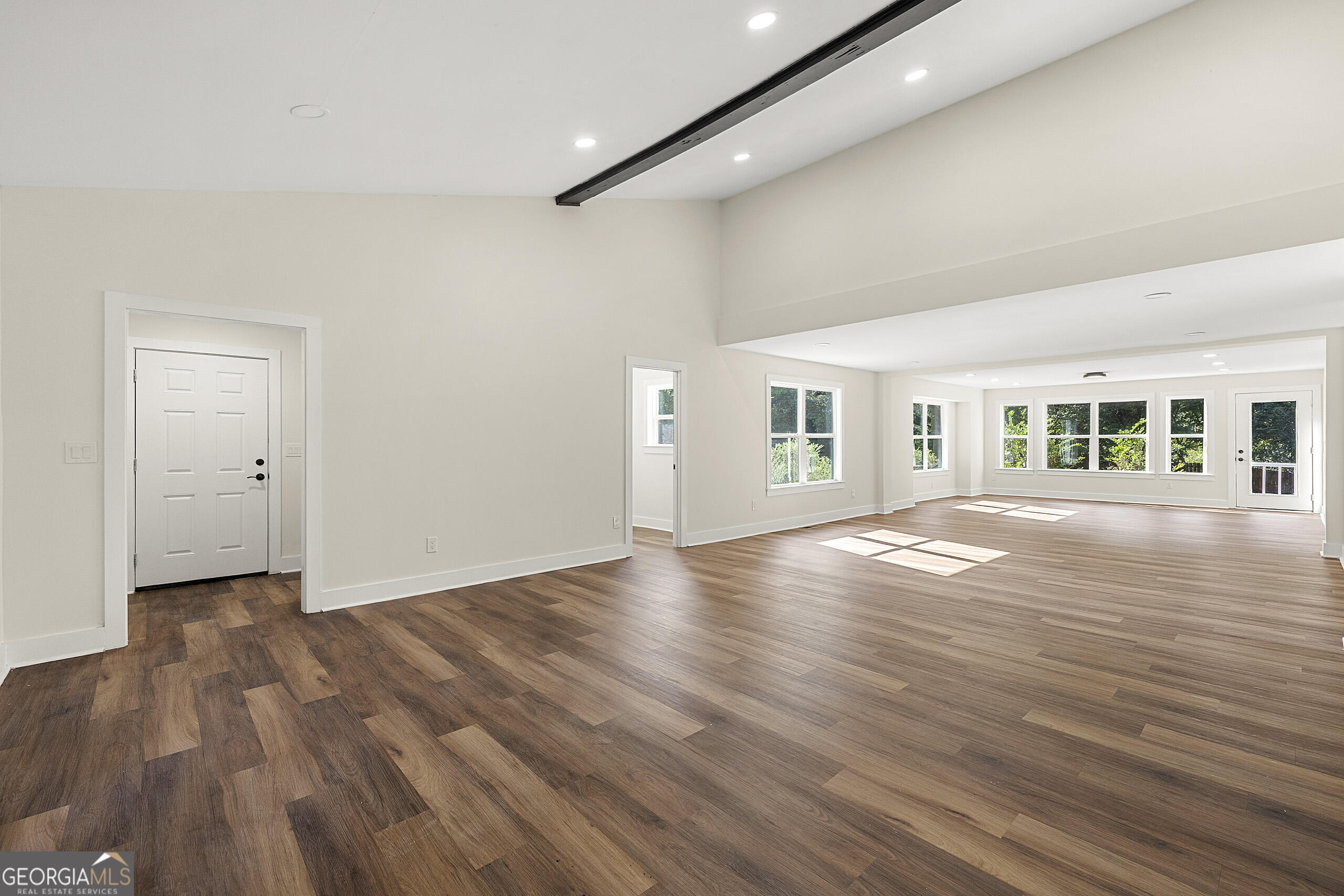 1620 Chevron Way Sandy Springs, GA 30350 - Photo 13 of 33 wooden floor in an empty room with a window