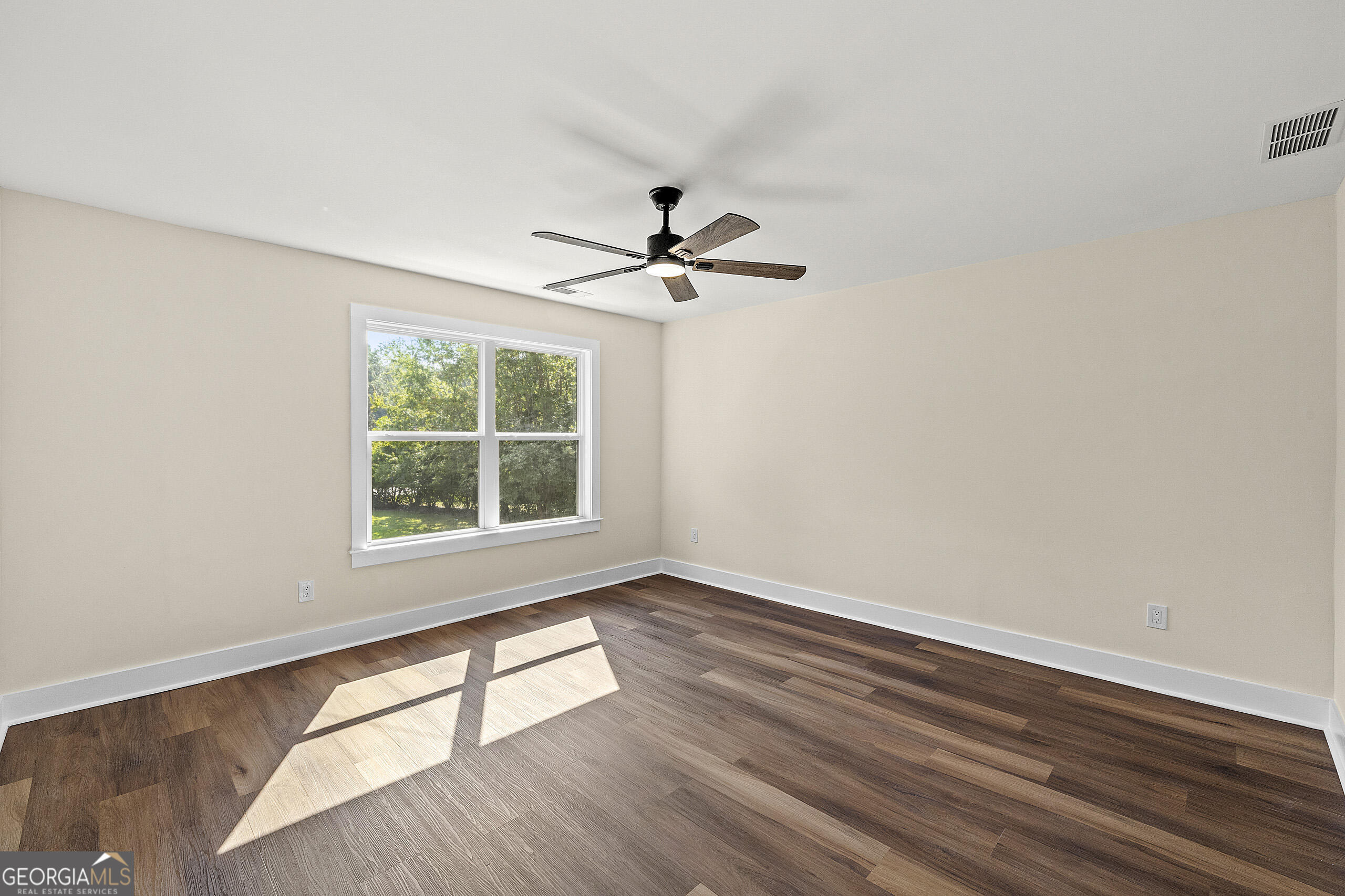 1620 Chevron Way Sandy Springs, GA 30350 - Photo 20 of 33 wooden floor in an empty room with a window
