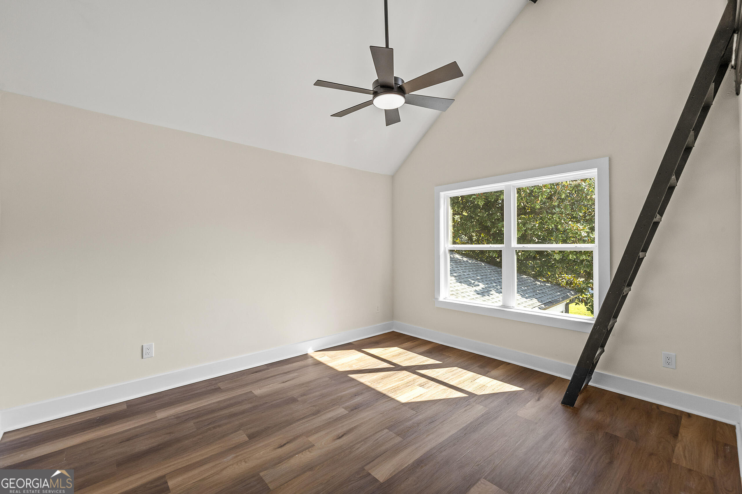 1620 Chevron Way Sandy Springs, GA 30350 - Photo 22 of 33 wooden floor in an empty room with a window