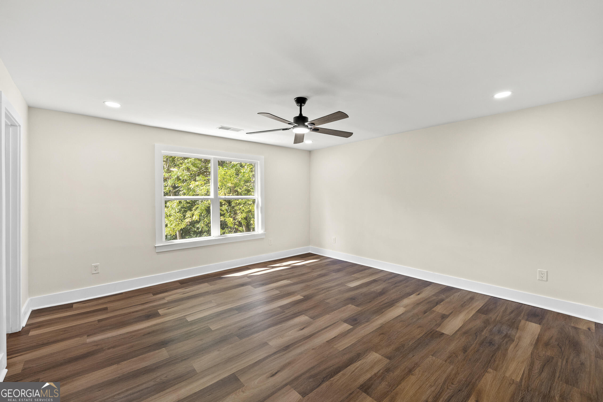 1620 Chevron Way Sandy Springs, GA 30350 - Photo 24 of 33 wooden floor in an empty room with a window