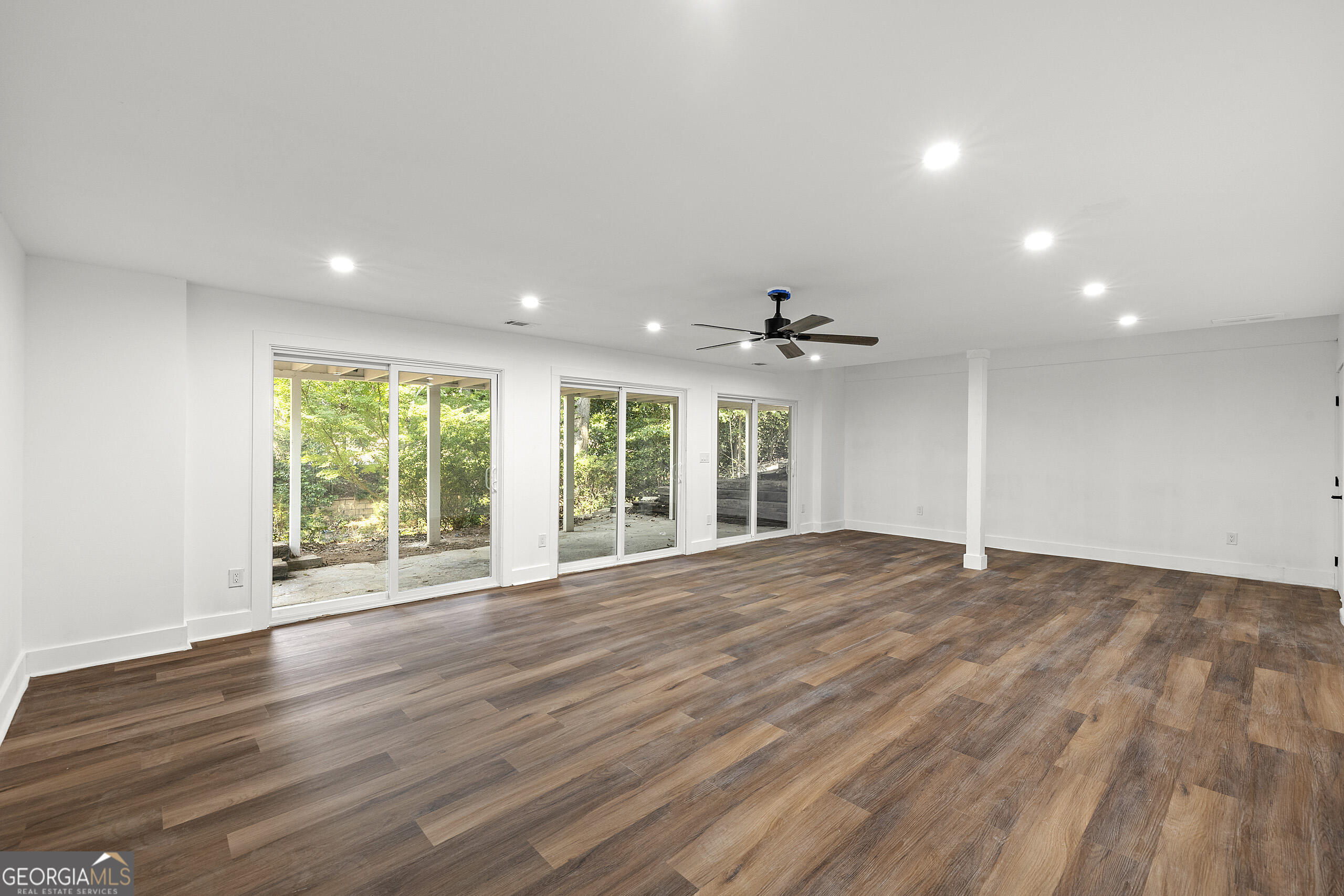 1620 Chevron Way Sandy Springs, GA 30350 - Photo 28 of 33 a view of an empty room with wooden floor and a window