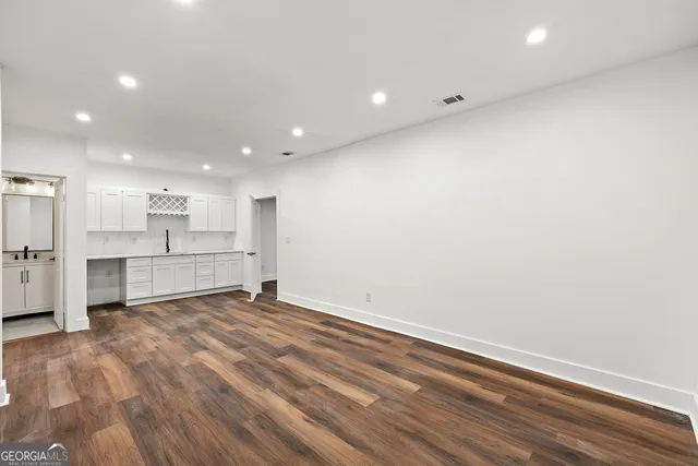a view of kitchen with wooden floor