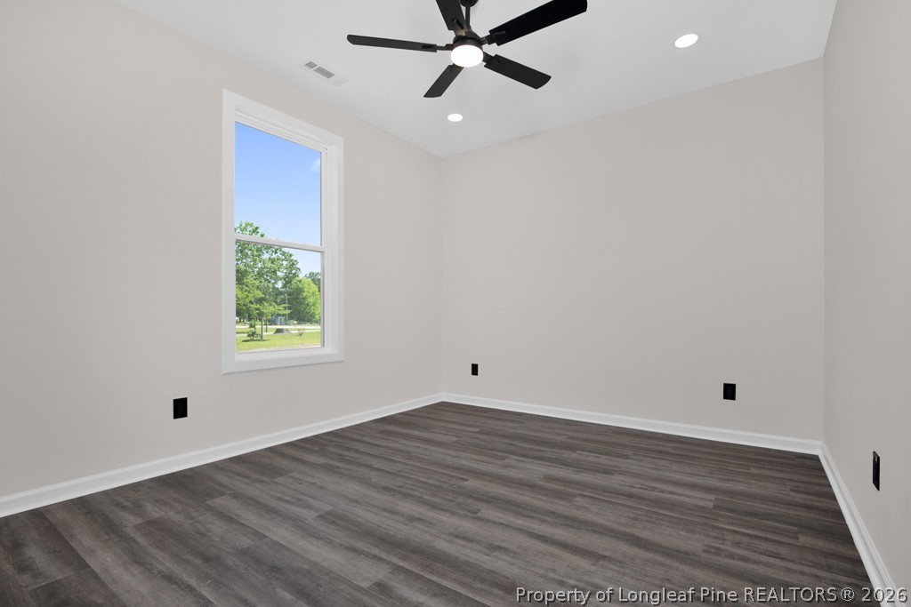 3025 Old Stage Road South Erwin, NC 28339 - Photo 28 of 50 wooden floor in an empty room with a window