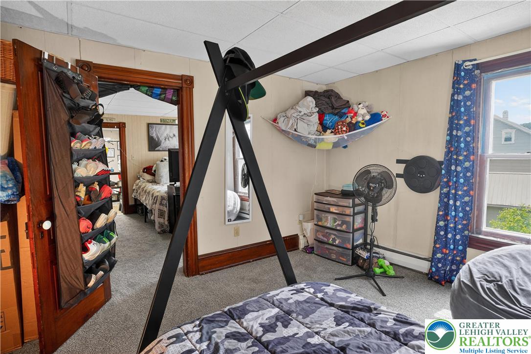 357 Main Road Lehighton, PA 18235 - Photo 24 of 38 a bed room with a bed and a couch