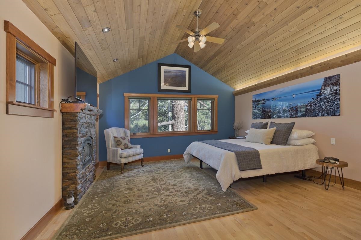 2500 Old Mammoth Road Mammoth Lakes, CA 93546 - Photo 25 of 48 a spacious bedroom with a bed and a large window
