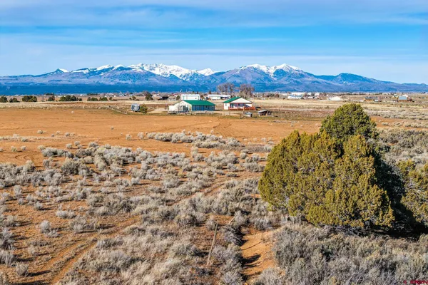 a view of an ocean and a mountain