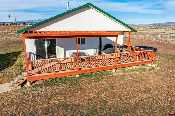 a view of a house with a roof deck