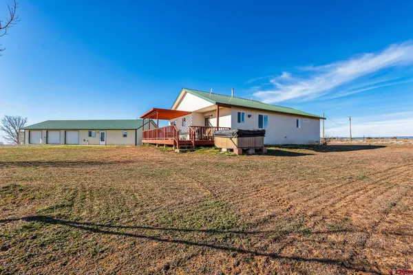 a view of a house with a patio