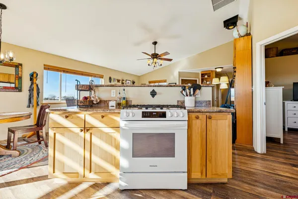 a very nice looking kitchen with a large window