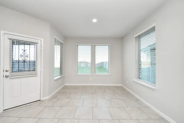 a spacious bathroom with a double vanity sink mirror and