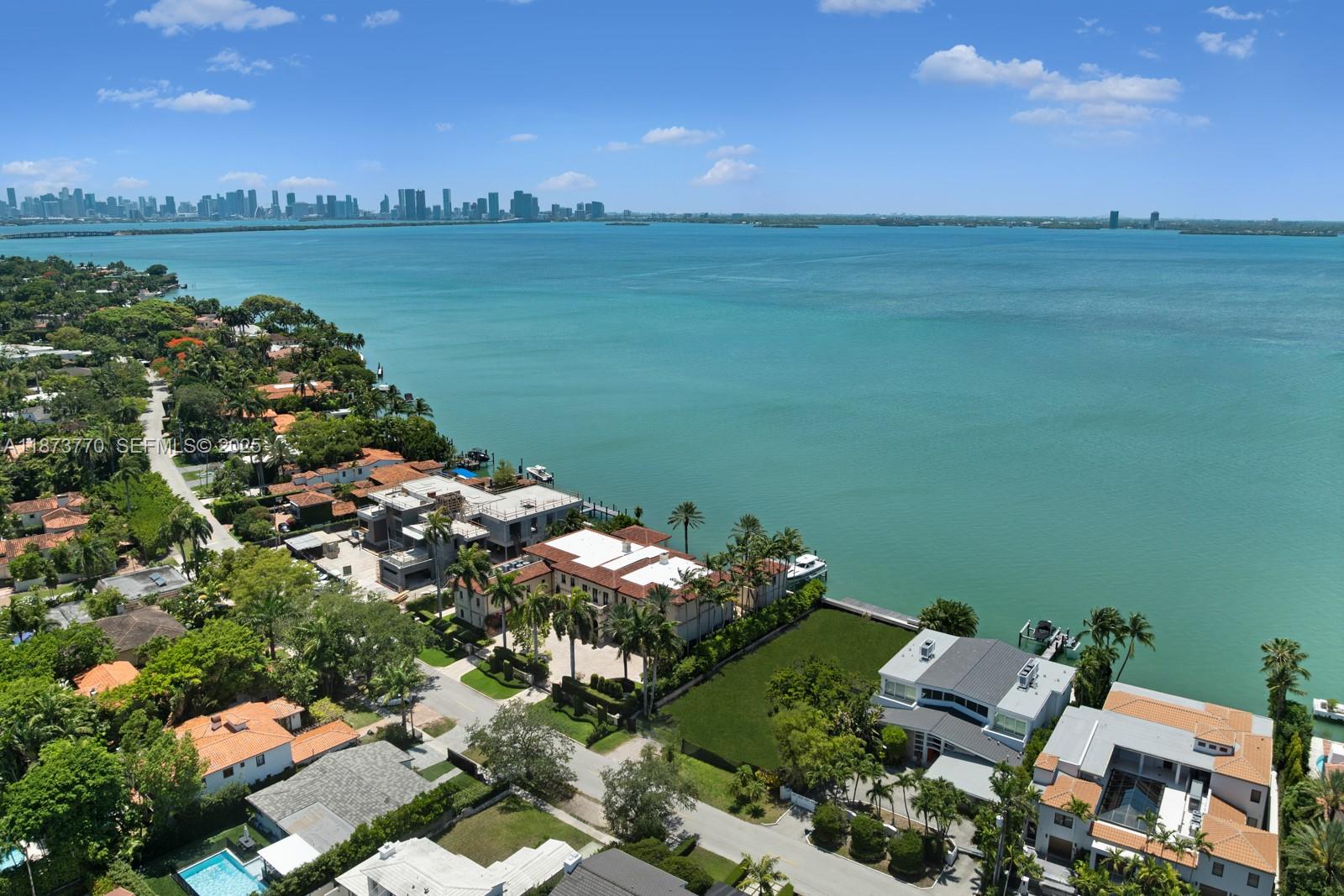 5226 North Bay Road Miami Beach, FL 33140 - Photo 8 of 13 an aerial view of a house with a lake view