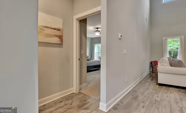 a living room with furniture and a gate