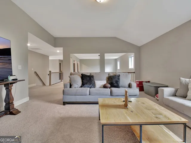 a view of a patio with a table chairs and a table