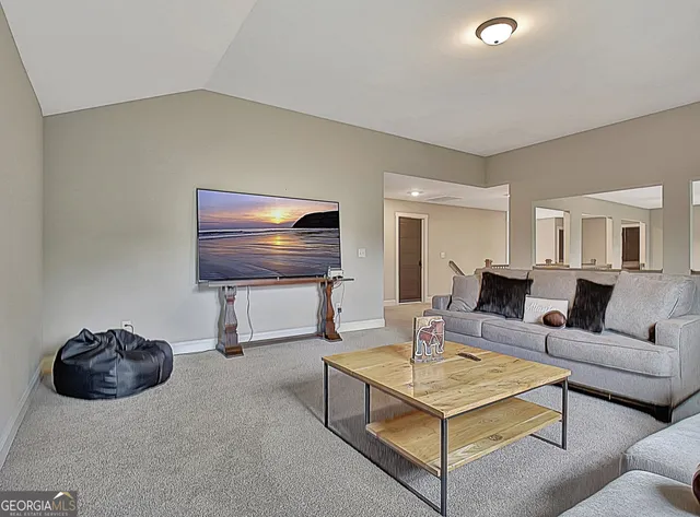 a big yard with lots of green space and trees