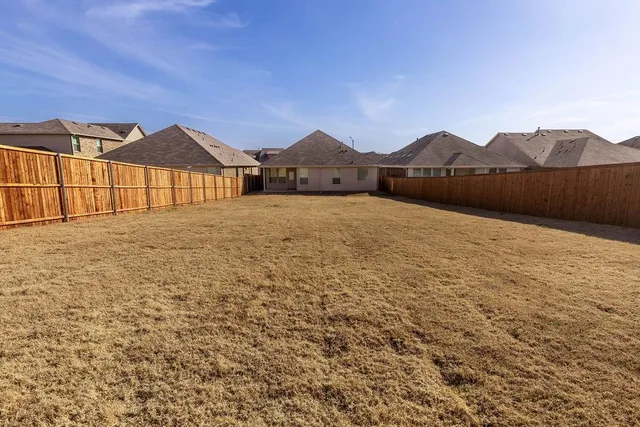 a view of an aerial view of residential houses with outdoor space