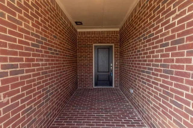 a view of a brick wall