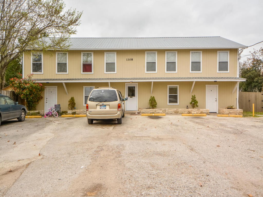 1308 Pine Street, Unit B Georgetown, TX 78626 - Photo 1 of 1 a car parked in front of a house